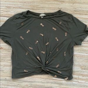 Green tshirt with twist front and gold pineapple